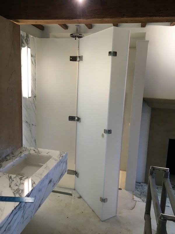 Bespoke frosted glass shower enclosure in Harrow luxury bathroom