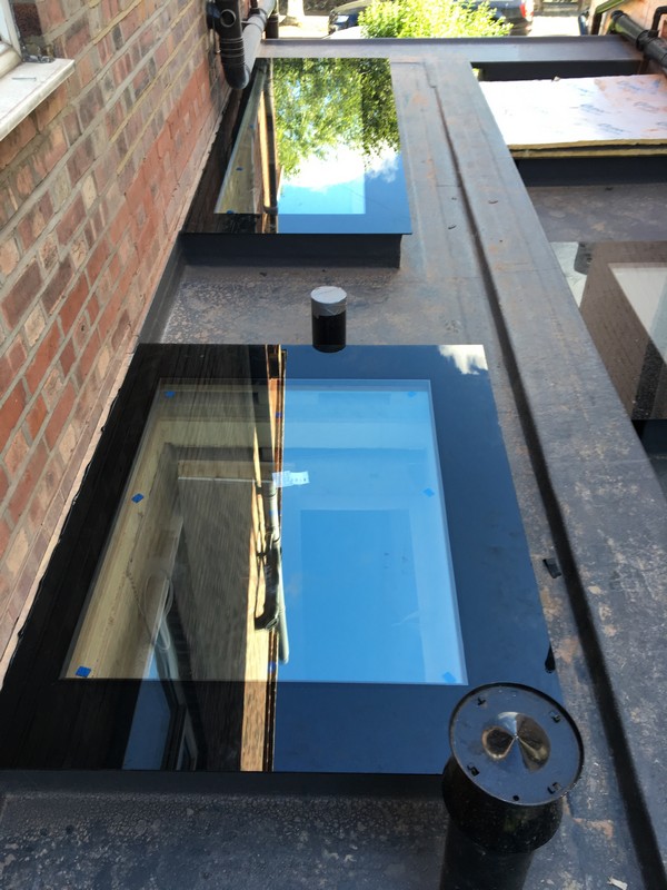 Multiple flat roof skylights on extension in Harrow